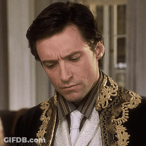 A Close Up Of A Man 'S Face With The Words David Worrell On The Bottom Right GIF