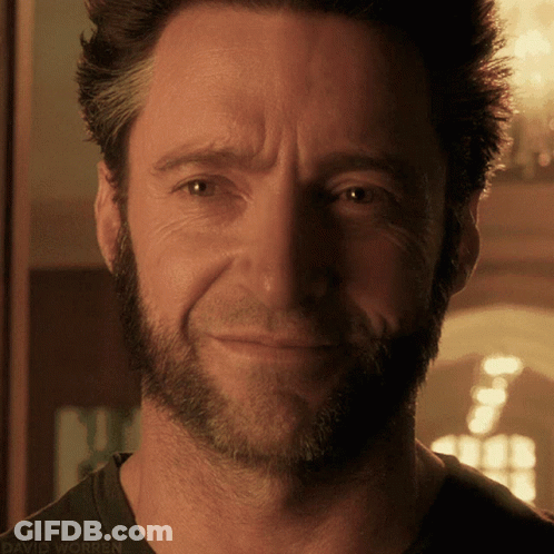 A Close Up Of A Man 'S Face With The Words David Worren On The Bottom Right GIF