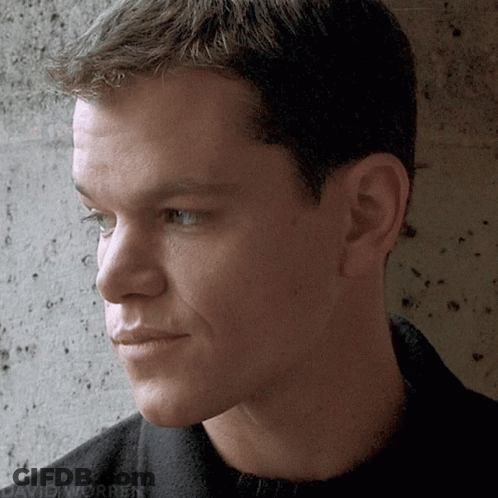 A Close Up Of A Man 'S Face With The Words David Worren On The Bottom GIF
