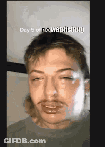 A Close Up Of A Man 'S Face With The Words " Day 5 Of No Webfishing " Above Him GIF