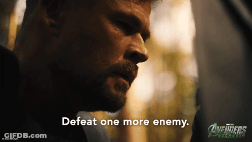 A Close Up Of A Man 'S Face With The Words Defeat One More Enemy GIF