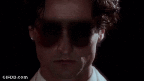 A Close Up Of A Man 'S Face With The Words " Eco Death " Above It GIF