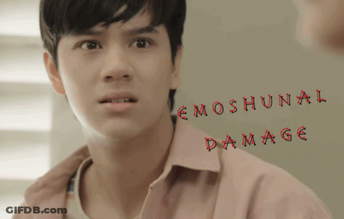 A Close Up Of A Man 'S Face With The Words Emoshunal Damage Written Below Him GIF