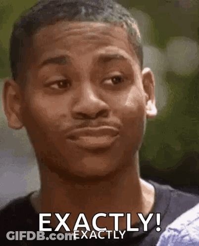 A Close Up Of A Man 'S Face With The Words `` Exactly '' Written On It . GIF