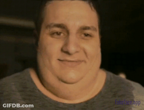 A Close Up Of A Man 'S Face With The Words Fakeface App Visible GIF