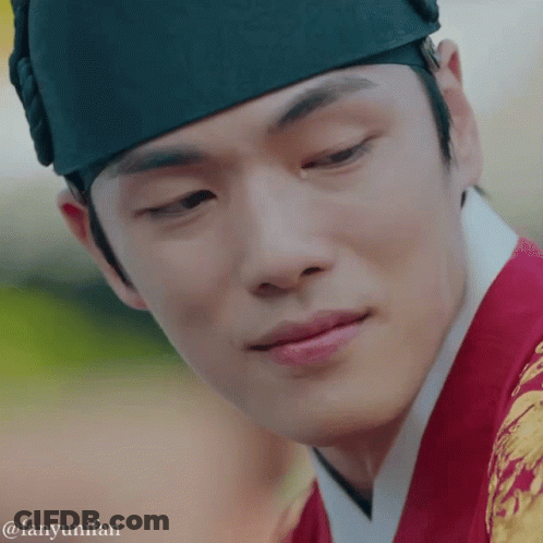 A Close Up Of A Man 'S Face With The Words Fanyunifan Written Below It GIF