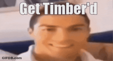 A Close Up Of A Man 'S Face With The Words Get Timber 'D Written On It GIF
