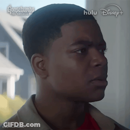 A Close Up Of A Man 'S Face With The Words Goosebumps On The Bottom Left GIF