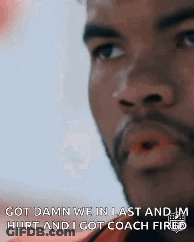 A Close Up Of A Man 'S Face With The Words Got Damn We In Last And Jm Hurt GIF