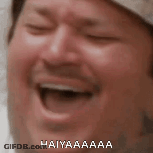 A Close Up Of A Man 'S Face With The Words Haiyaaaa Written Below Him GIF