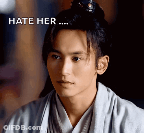 A Close Up Of A Man 'S Face With The Words Hate Her Above It GIF