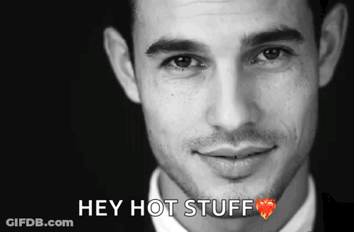 A Close Up Of A Man 'S Face With The Words Hey Hot Stuff Above It GIF