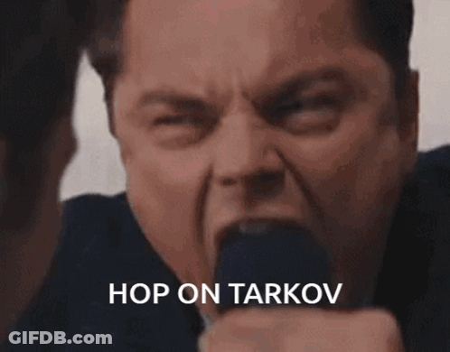 A Close Up Of A Man 'S Face With The Words Hop On Tarkov Written Below Him GIF
