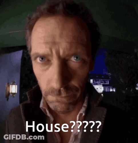 A Close Up Of A Man 'S Face With The Words House Written Below It GIF
