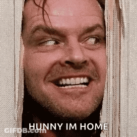 A Close Up Of A Man 'S Face With The Words Hunny Im Home Written Below It . GIF