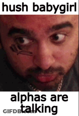 A Close Up Of A Man 'S Face With The Words Hush Babygirl Alphas Are Talking On The Bottom GIF