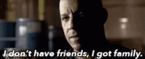 A Close Up Of A Man 'S Face With The Words `` I Do N't Have Friends , I Got Family . '' GIF
