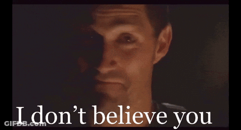 A Close Up Of A Man 'S Face With The Words " I Don 'T Believe You " Below It GIF