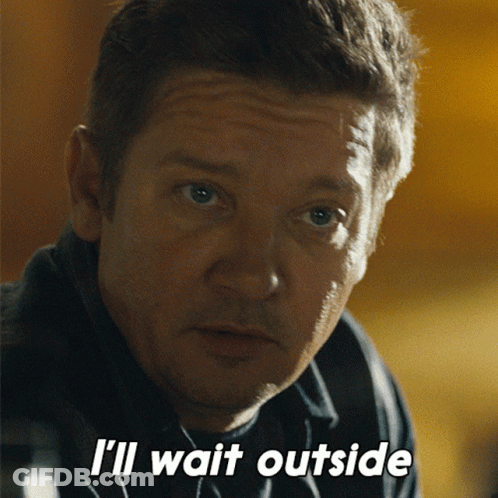 A Close Up Of A Man 'S Face With The Words I 'Ll Wait Outside Below Him GIF