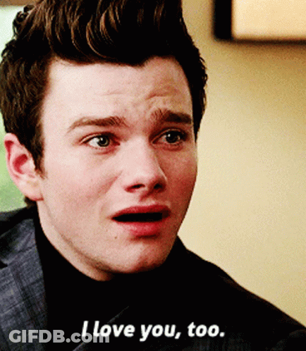 A Close Up Of A Man 'S Face With The Words I Love You Too GIF