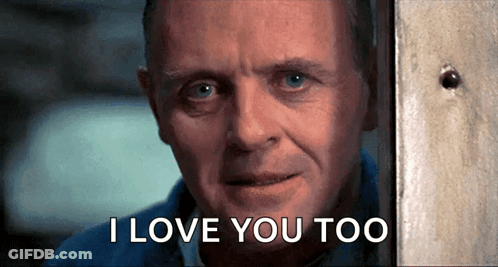 A Close Up Of A Man 'S Face With The Words I Love You Too Below Him GIF