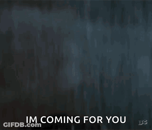 A Close Up Of A Man 'S Face With The Words I 'M Coming For You Written Below Him GIF