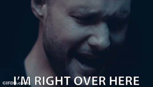 A Close Up Of A Man 'S Face With The Words " I 'M Right Over Here " Below Him GIF