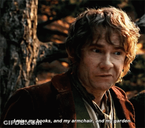 A Close Up Of A Man 'S Face With The Words " I Miss My Books And My Armchair And My Garden " GIF