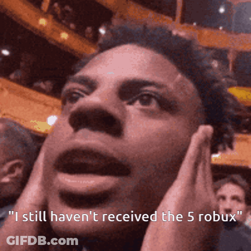 A Close Up Of A Man 'S Face With The Words " I Still Haven 'T Received The 5 Robux " Below Him GIF