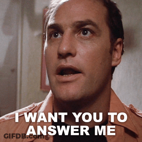 A Close Up Of A Man 'S Face With The Words I Want You To Answer Me Above Him GIF