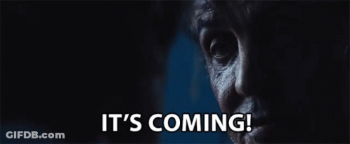 A Close Up Of A Man 'S Face With The Words It 'S Coming Written Below It GIF