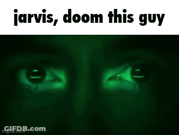 A Close Up Of A Man 'S Face With The Words Jarvis , Doom This Guy Written On The Bottom . GIF