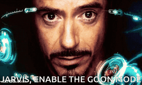 A Close Up Of A Man 'S Face With The Words Jarvis Enable The Goon Mode Above Him GIF