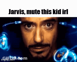 A Close Up Of A Man 'S Face With The Words Jarvis Mute This Kid Irl On The Bottom GIF