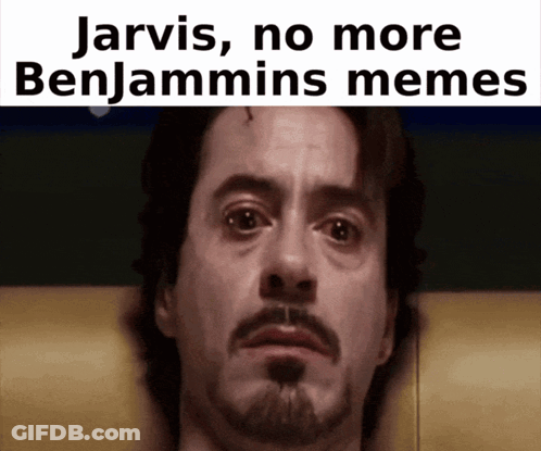 A Close Up Of A Man 'S Face With The Words Jarvis No More Benjamins Memes Above Him GIF