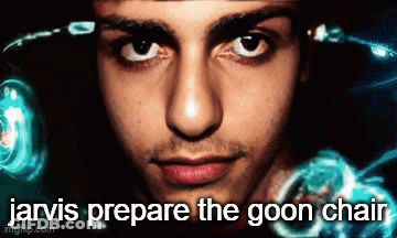 A Close Up Of A Man 'S Face With The Words Jarvis Prepare The Goon Chair Below Him GIF