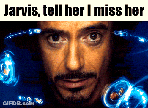 A Close Up Of A Man 'S Face With The Words Jarvis Tell Her I Miss Her Above Him GIF