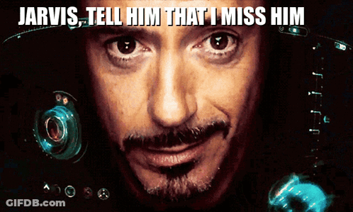 A Close Up Of A Man 'S Face With The Words Jarvis Tell Him That I Miss Him Above It GIF