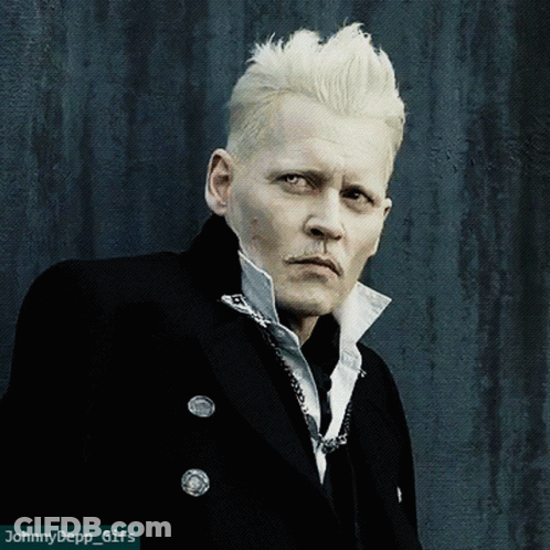 A Close Up Of A Man 'S Face With The Words Johnny Depp Gifs Below Him GIF