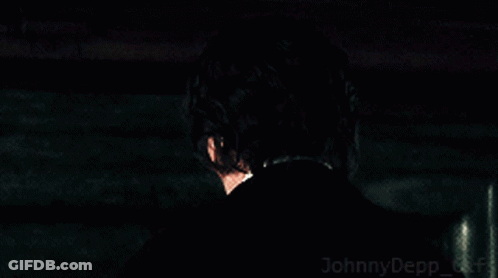 A Close Up Of A Man 'S Face With The Words Johnny Depp Gifs On The Bottom Right GIF