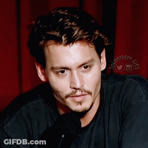 A Close Up Of A Man 'S Face With The Words Johnny Depp Gifs On The Bottom Right GIF