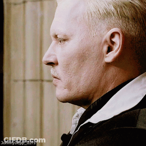 A Close Up Of A Man 'S Face With The Words Johnnydepp_gifs Below It GIF