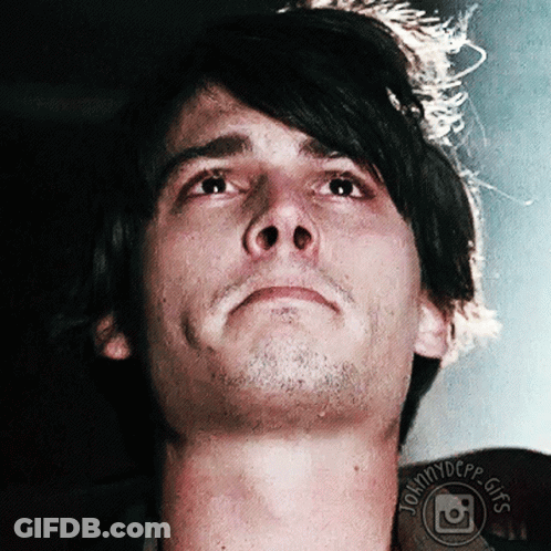 A Close Up Of A Man 'S Face With The Words Johnnydepp Gifs On The Bottom Right GIF