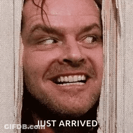A Close Up Of A Man 'S Face With The Words `` Just Arrived '' Written Next To Him . GIF