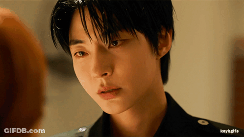 A Close Up Of A Man 'S Face With The Words Keybgifs Below Him GIF
