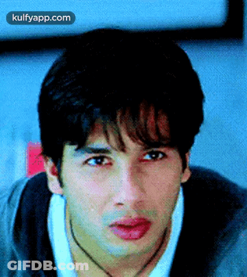 A Close Up Of A Man 'S Face With The Words Kulfyapp.com At The Top GIF