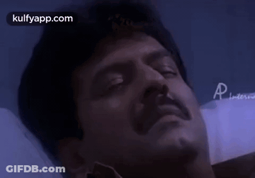 A Close Up Of A Man 'S Face With The Words Kulfyapp.com In The Upper Right Corner GIF