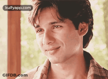 A Close Up Of A Man 'S Face With The Words Kulfyapp.com Written On The Bottom GIF