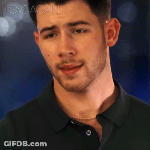 A Close Up Of A Man 'S Face With The Words Love Again Written Above Him GIF