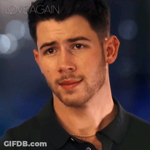 A Close Up Of A Man 'S Face With The Words Love Again Written Above Him GIF